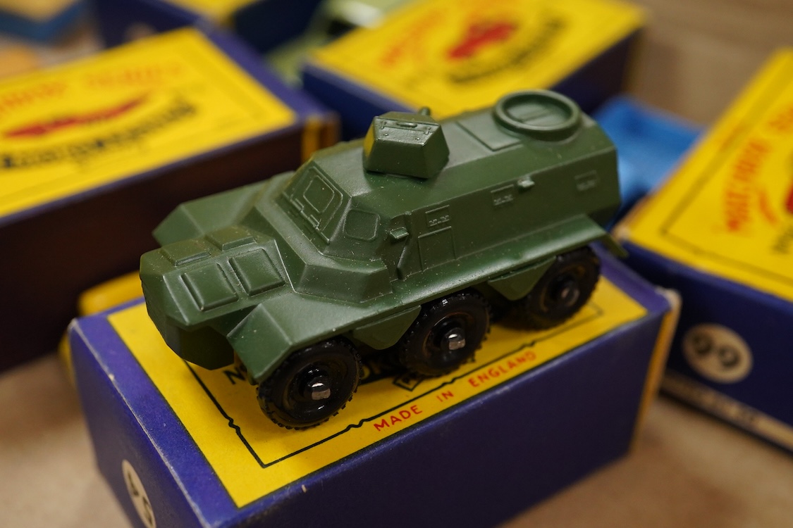 Eleven boxed Matchbox Series 1-75 regular wheels vehicles; 46; Morris Minor, 48; Meteor sports boat and trailer, 50; Commer pick-up truck (creasing to one end of the box), 54; Saracen personnel carrier, 55; DUKW amphibia